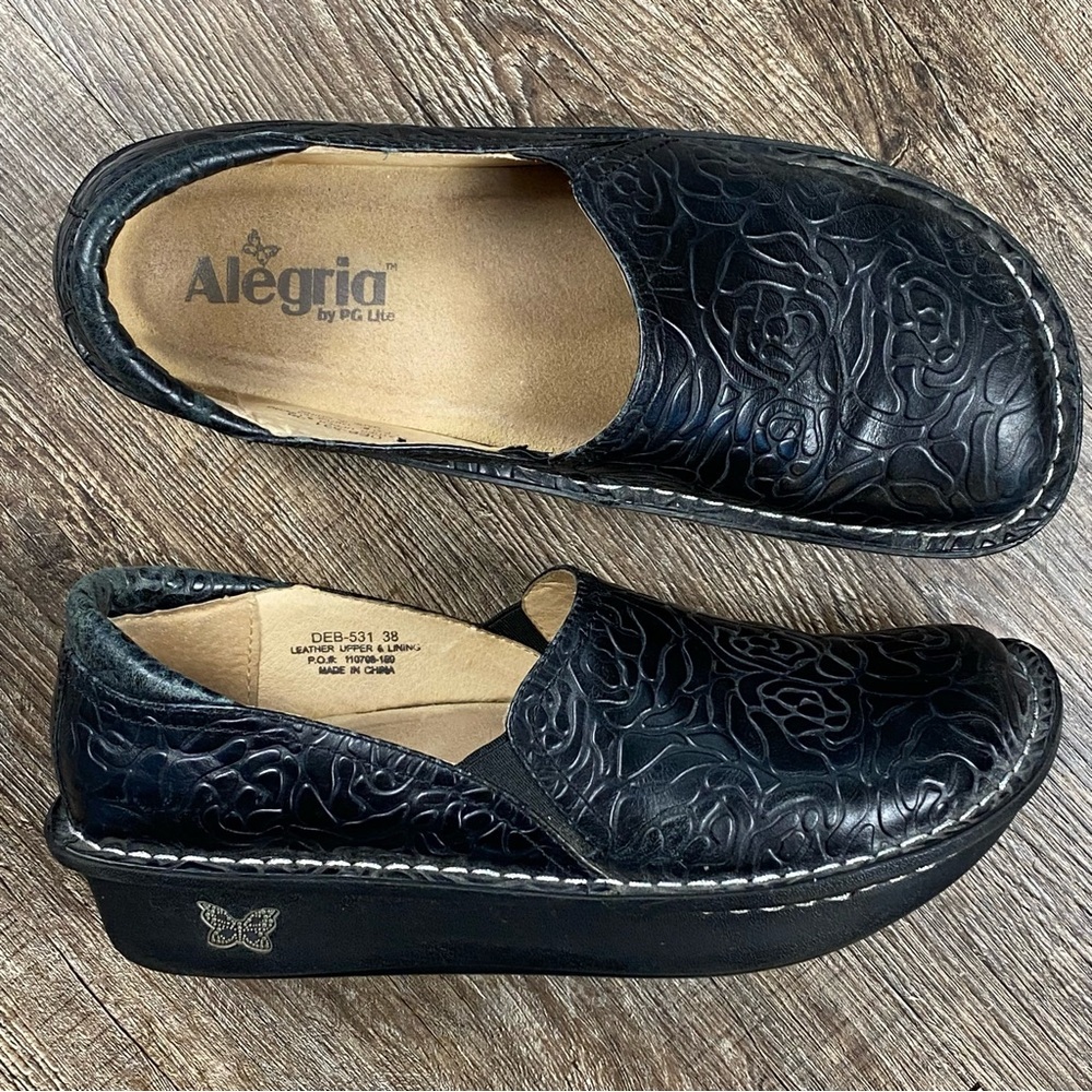 Alegria Black Embossed Leather Platform Clogs